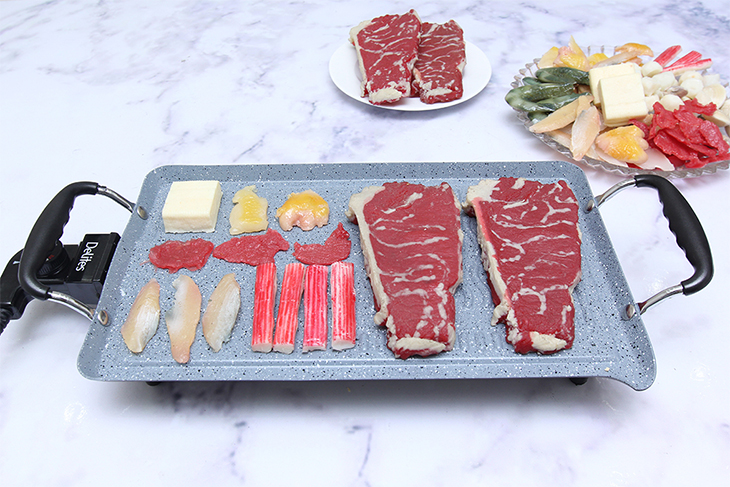 Nên mua bếp nướng điện hay lò nướng cho Tết này?